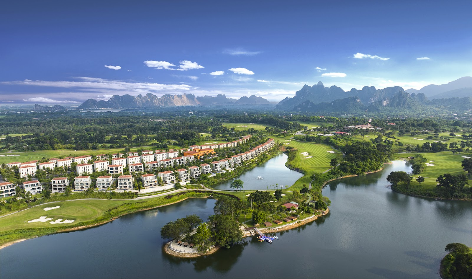 Sky Lake Resort and Golf Club near Hanoi, Vietnam, fairways set among wooded hills and a lake