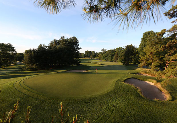 Classic American championship golf course with sandy bunkering and pines