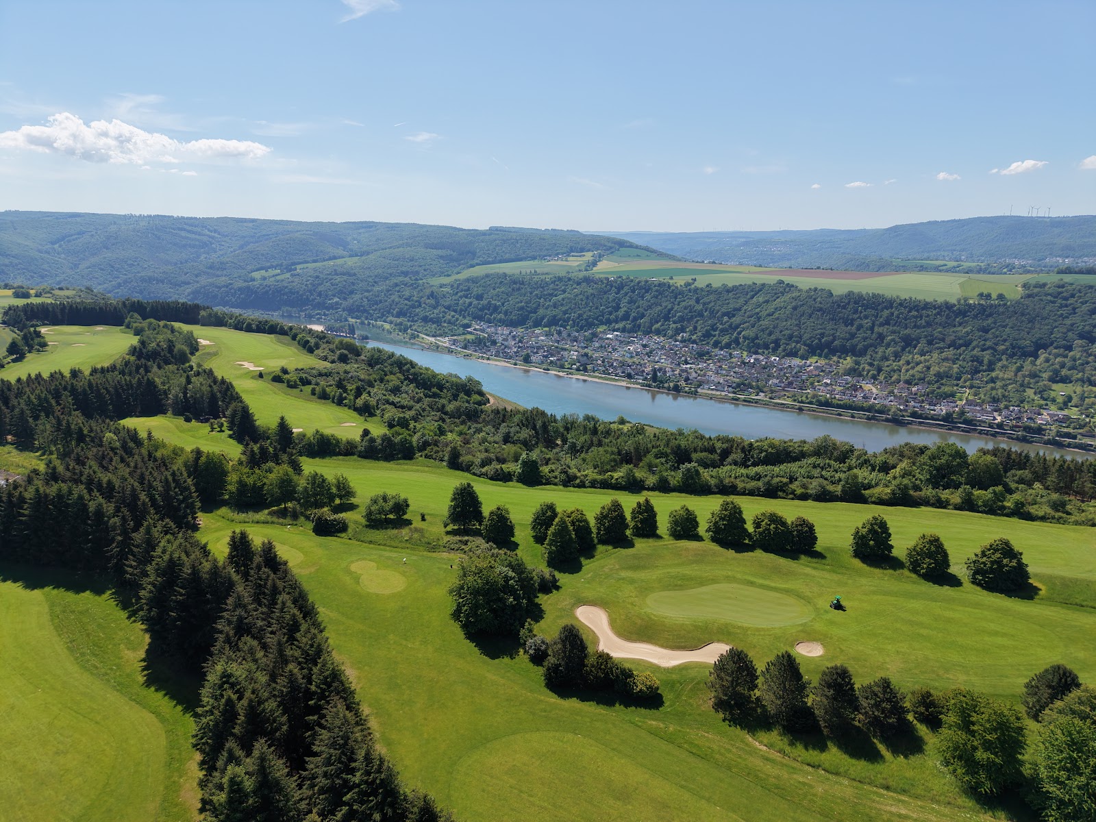 Fairways of Golfanlage Jakobsberg on its plateau between forest and vineyards above the Rhine gorge near Boppard, Germany