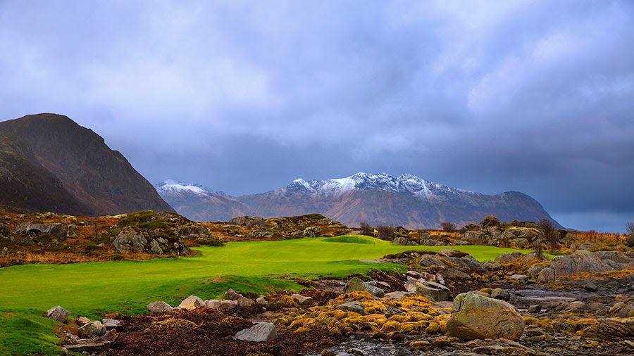 Lofoten Links in northern Norway under the midnight sun, fairways between the ocean and granite peaks