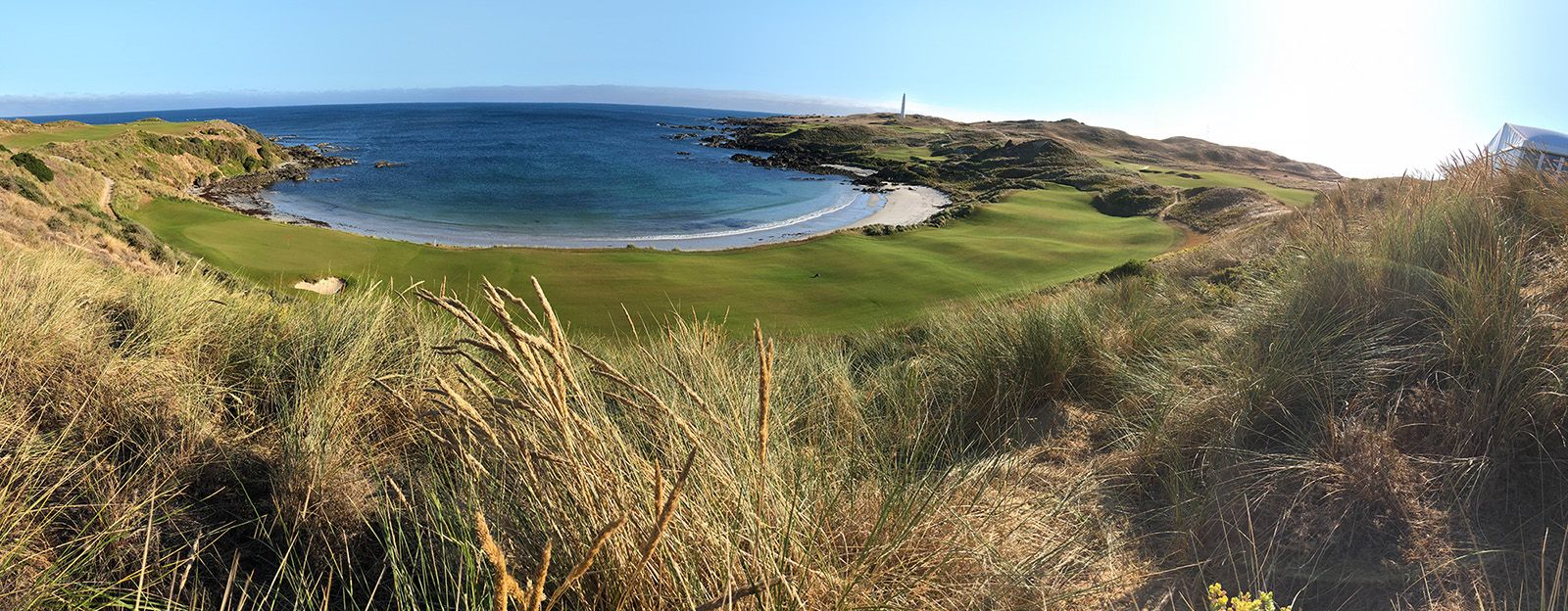 Cape Wickham Links, coastal fairway and lighthouse above Bass Strait on King Island, Australia