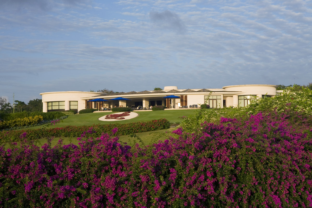 The Green Monkey at Sandy Lane, fairways set against exposed limestone quarry walls in St James, Barbados