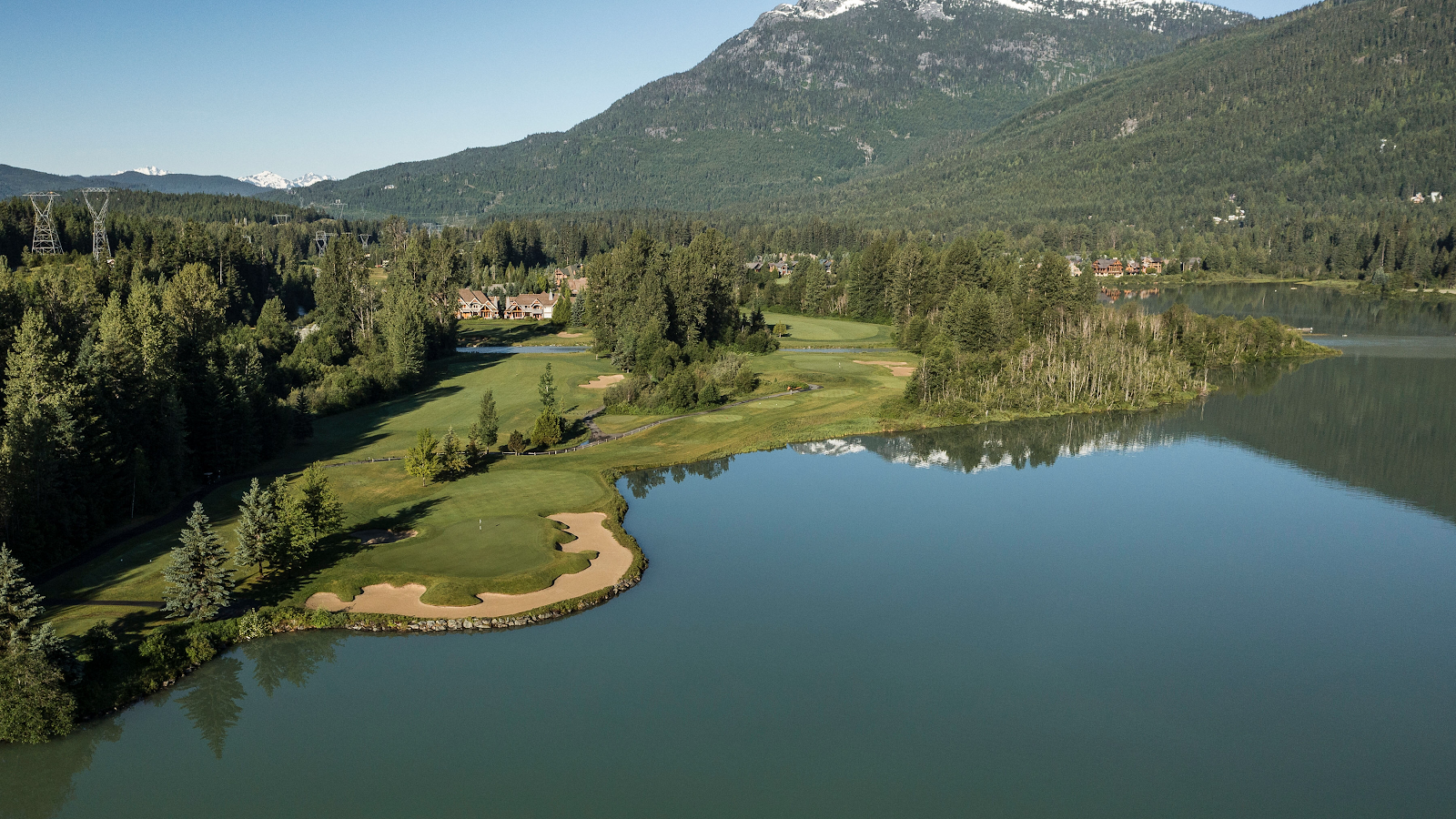 Nicklaus North Golf Course, fairway running toward Green Lake and the glaciated peaks above Whistler, British Columbia
