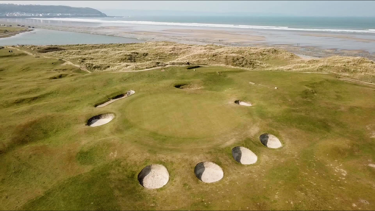 Royal North Devon Golf Club at Westward Ho!, links common grazed by sheep with the Pebble Ridge beyond