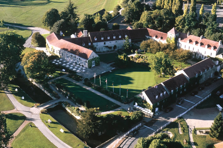 Golf de Saint-Nom-la-Breteche, rolling parkland fairway and trees west of Paris near Versailles, France