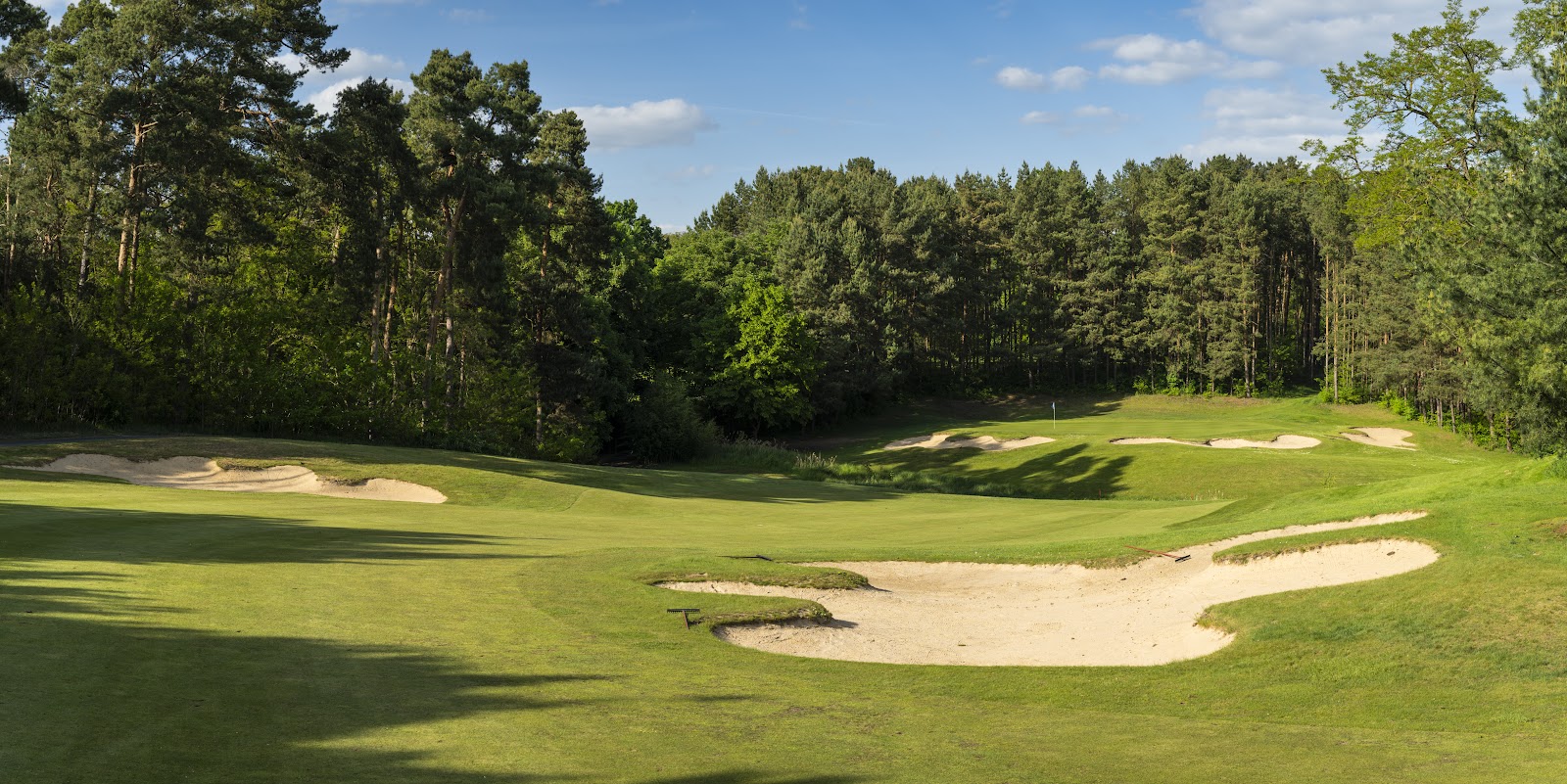 Sporting Club Berlin Faldo Course, links style fairway and pot bunkers by Lake Scharmutzel, Germany