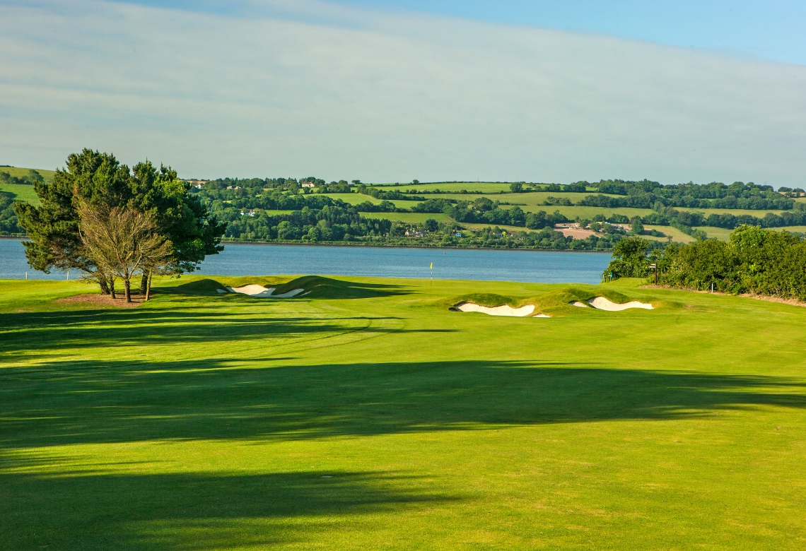 Cork Golf Club at Little Island, parkland fairways and old limestone quarry walls on Cork Harbour, Ireland