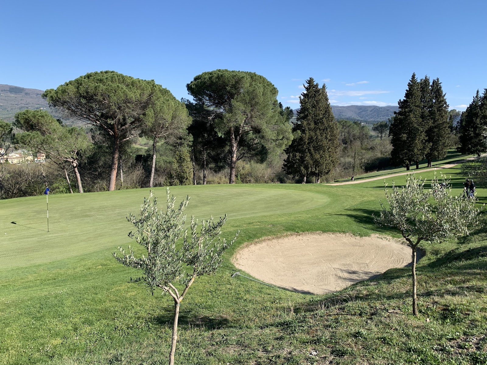 Ugolino Golf Club, fairway rolling through Chianti vines and olive groves south of Florence, Italy