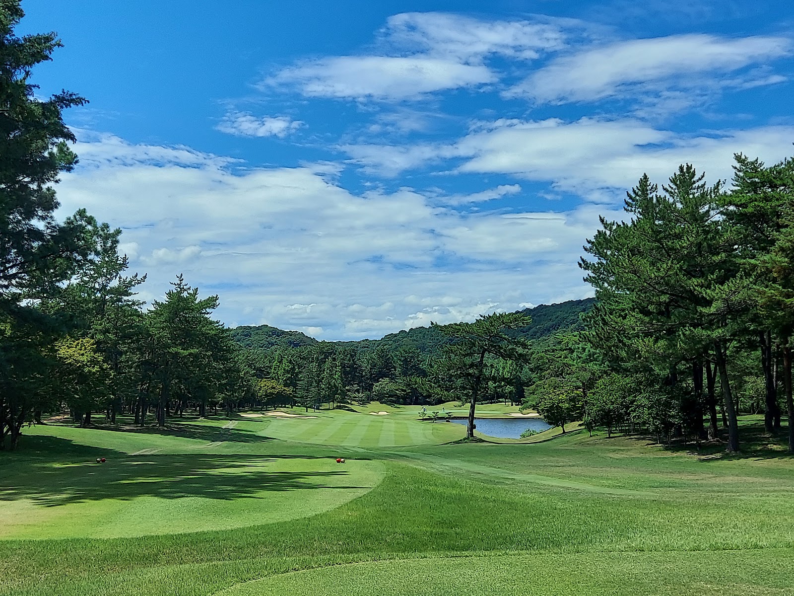 Ono Golf Club, wooded fairway and pond on the Osamu Ueda layout in the hills of Hyogo, Japan