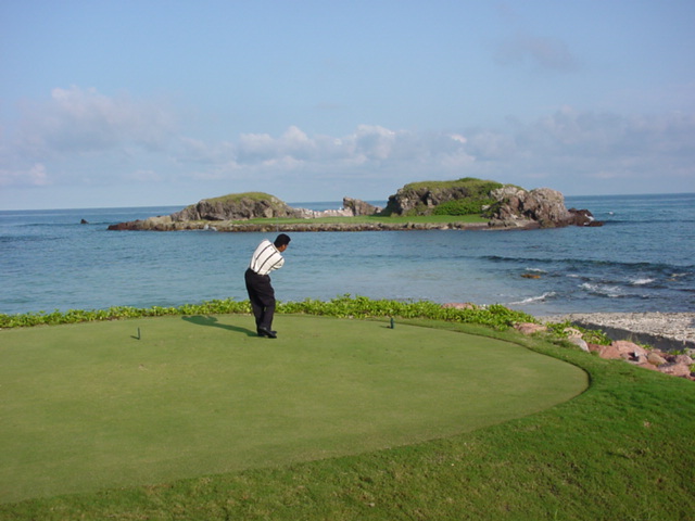 Punta Mita Golf Club on the Riviera Nayarit, the Tail of the Whale island green offshore in Banderas Bay