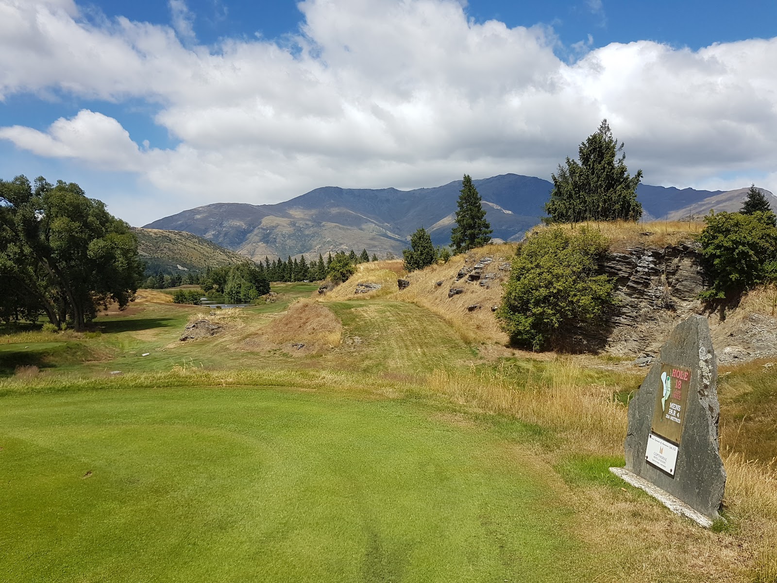 Arrowtown Golf Club, valley fairway framed by mountains near Queenstown, New Zealand