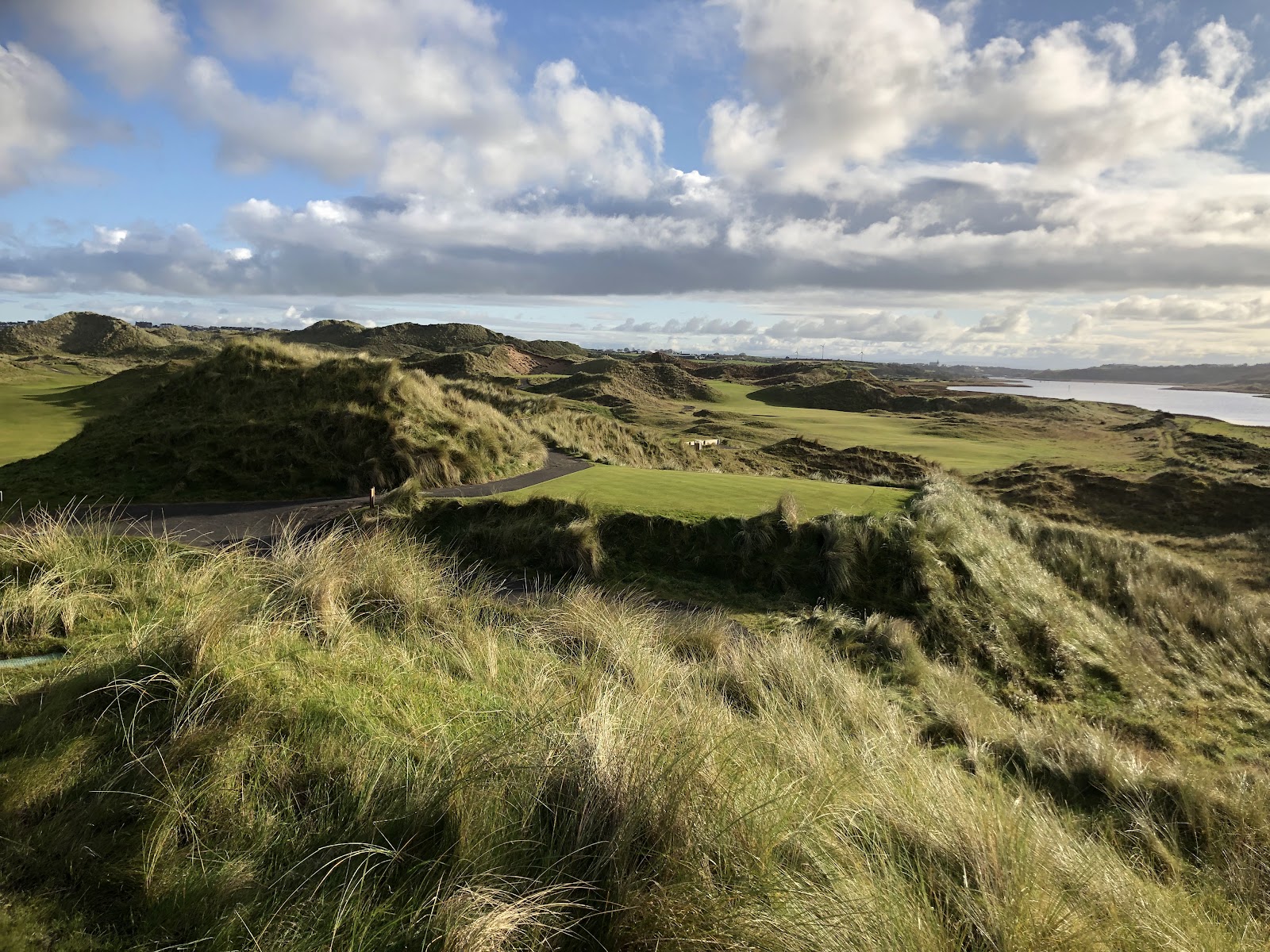 Portstewart Strand Course, links holes through towering dunes above the River Bann estuary on the Causeway Coast
