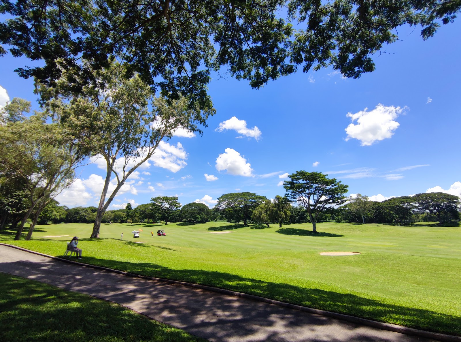 Manila Southwoods Masters course, Jack Nicklaus championship fairway and lake in Carmona, Cavite, Philippines