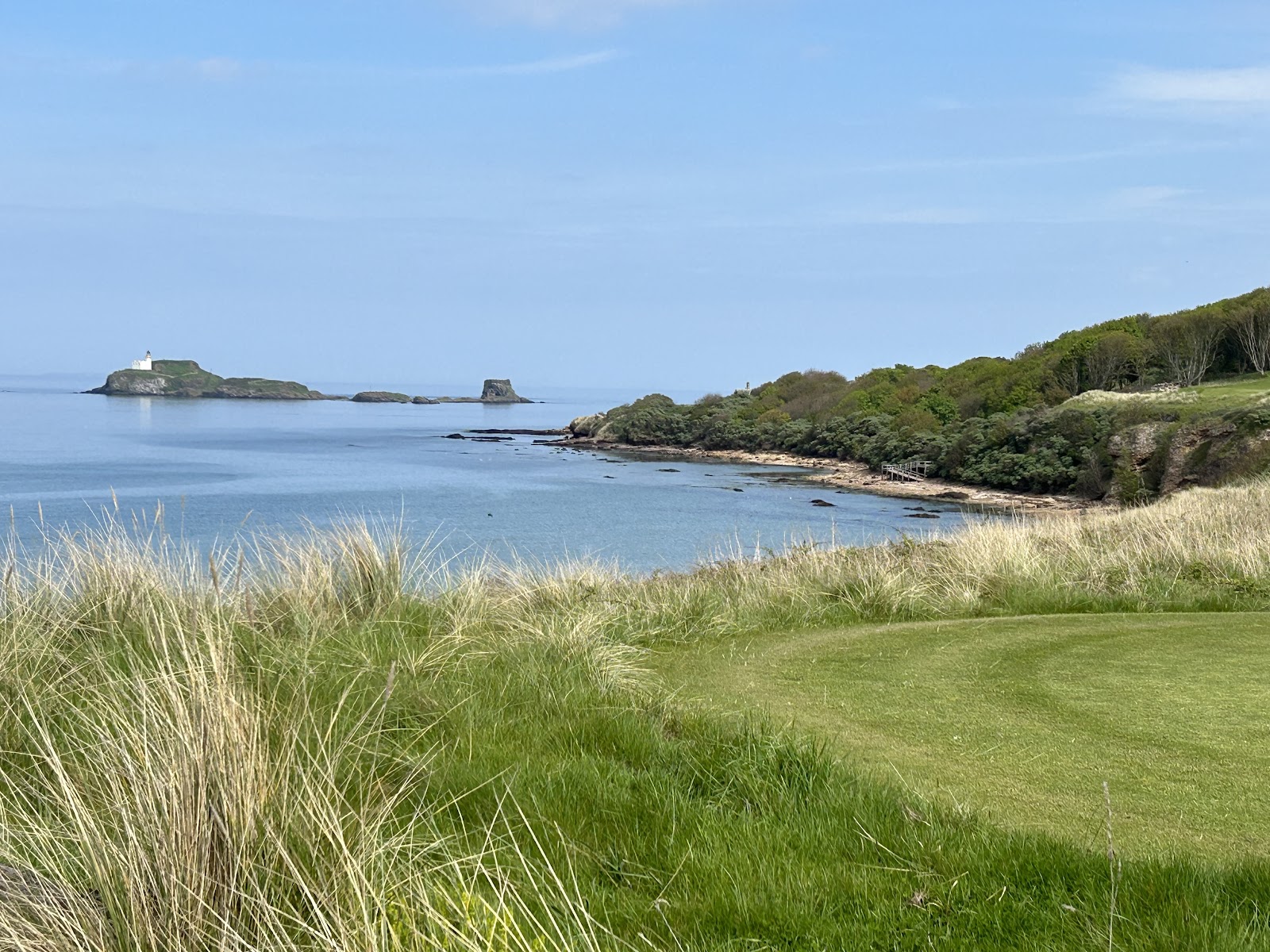 Archerfield Links Fidra course, wooded and links fairways near Dirleton with the Firth of Forth beyond, East Lothian
