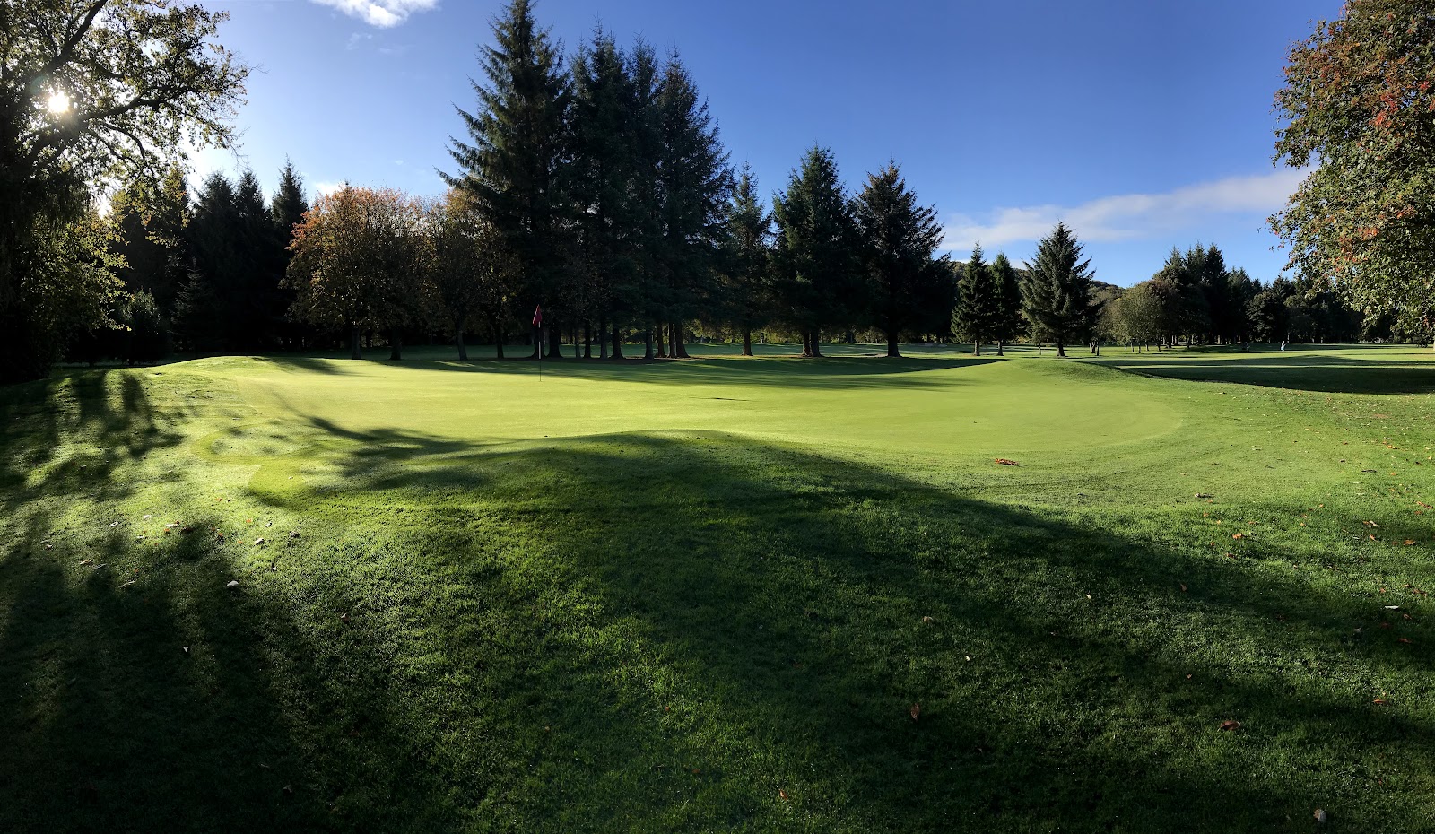Duff House Royal Golf Club, flat parkland fairways and large two-tier greens beside the River Deveron at Banff, Aberdeenshire Scotland