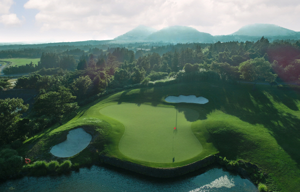 Pinx Golf Club, highland fairway on the southern slopes below Mount Halla, Jeju Island, South Korea