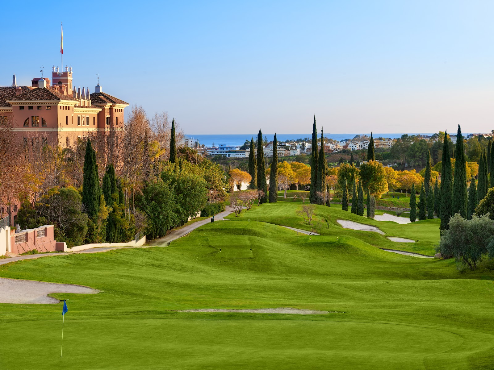Flamingos Golf at Villa Padierna, fairways through olives and cypresses with Mediterranean views, Benahavis, Spain