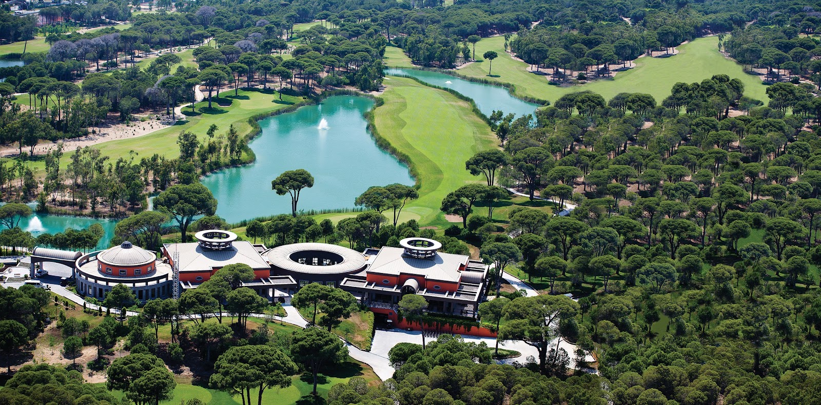 Cornelia Faldo Course, pine framed fairway at Cornelia Golf Club in Belek on the Turkish Riviera