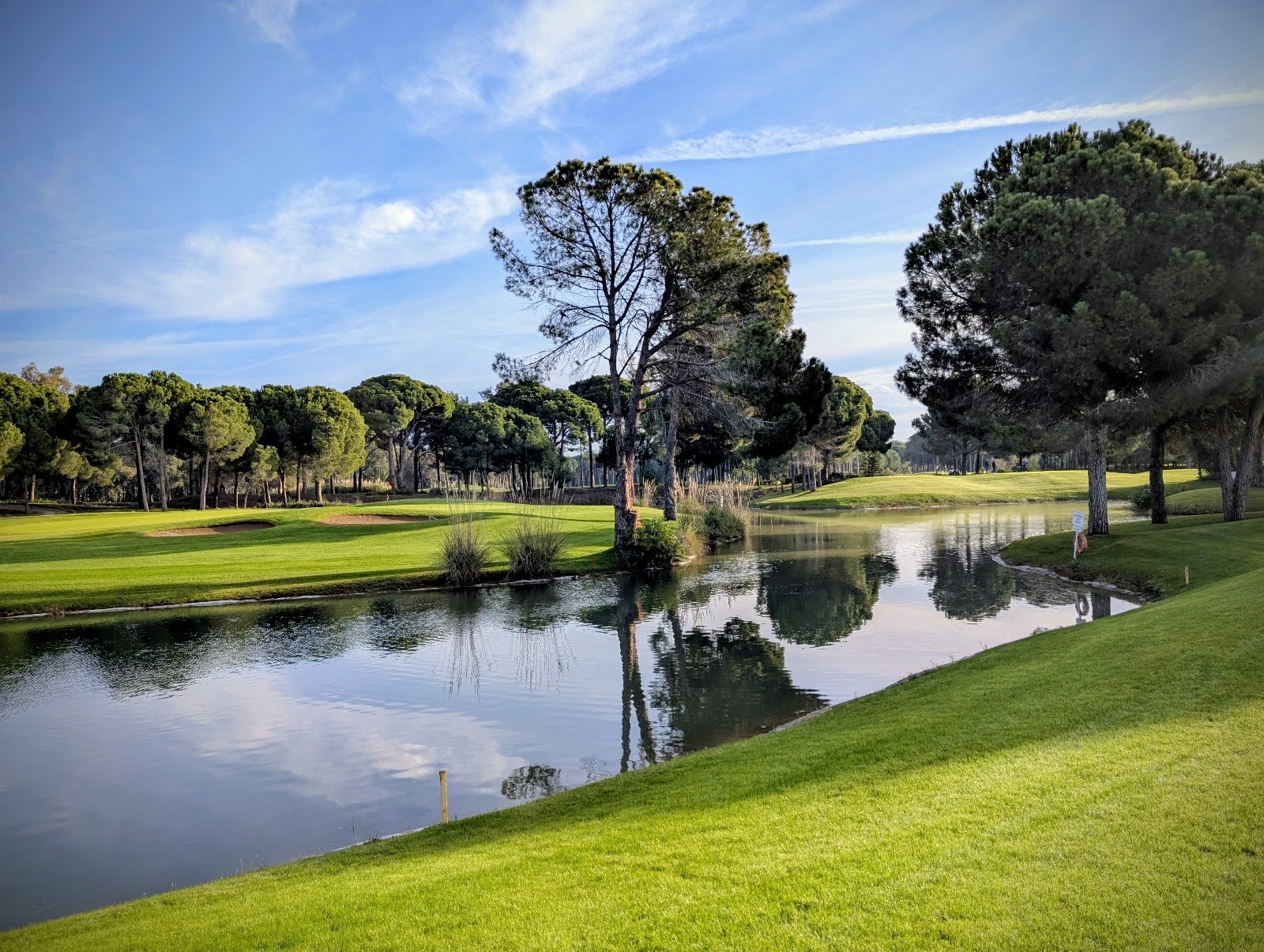 Sueno Golf Club in Belek, lake lined fairways running through umbrella pines on the Dunes course, Turkey