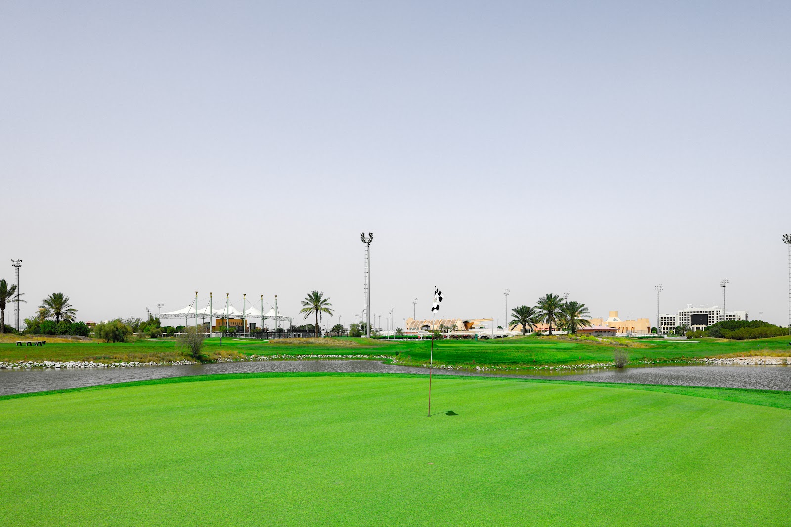 Al Ain Equestrian, Shooting & Golf Club, desert style fairway framed by dunes in the oasis city of Al Ain, UAE