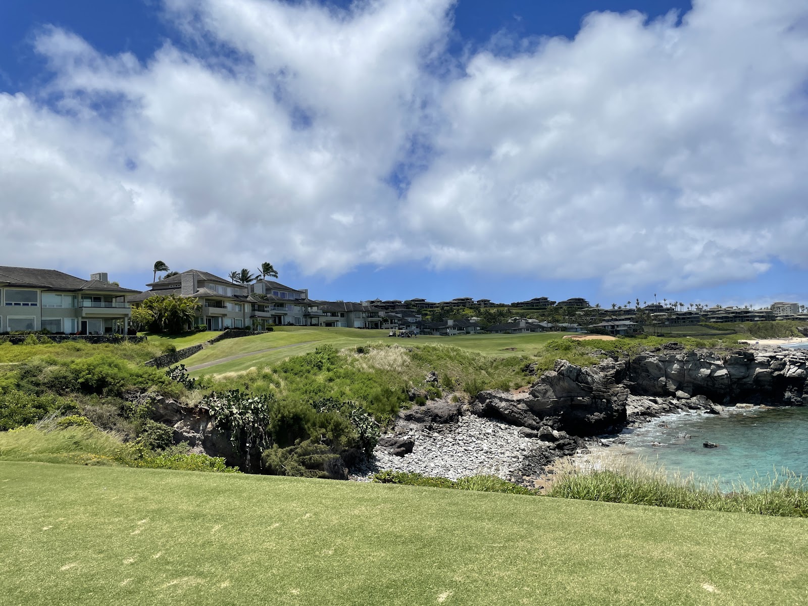 Kapalua Bay Course, coastal fairways and tropical landscaping along the northwest shore of Maui