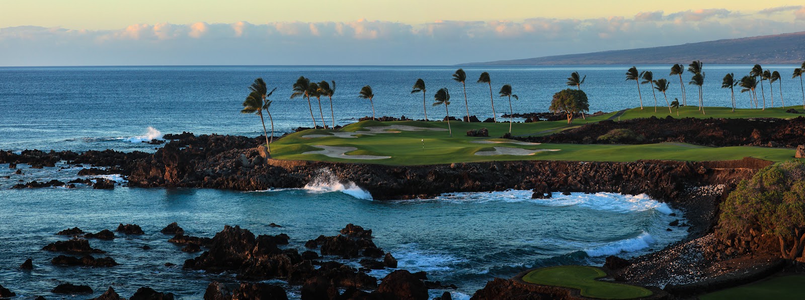 Mauna Lani South Course, fairways winding through black lava toward the Pacific on the Kohala Coast