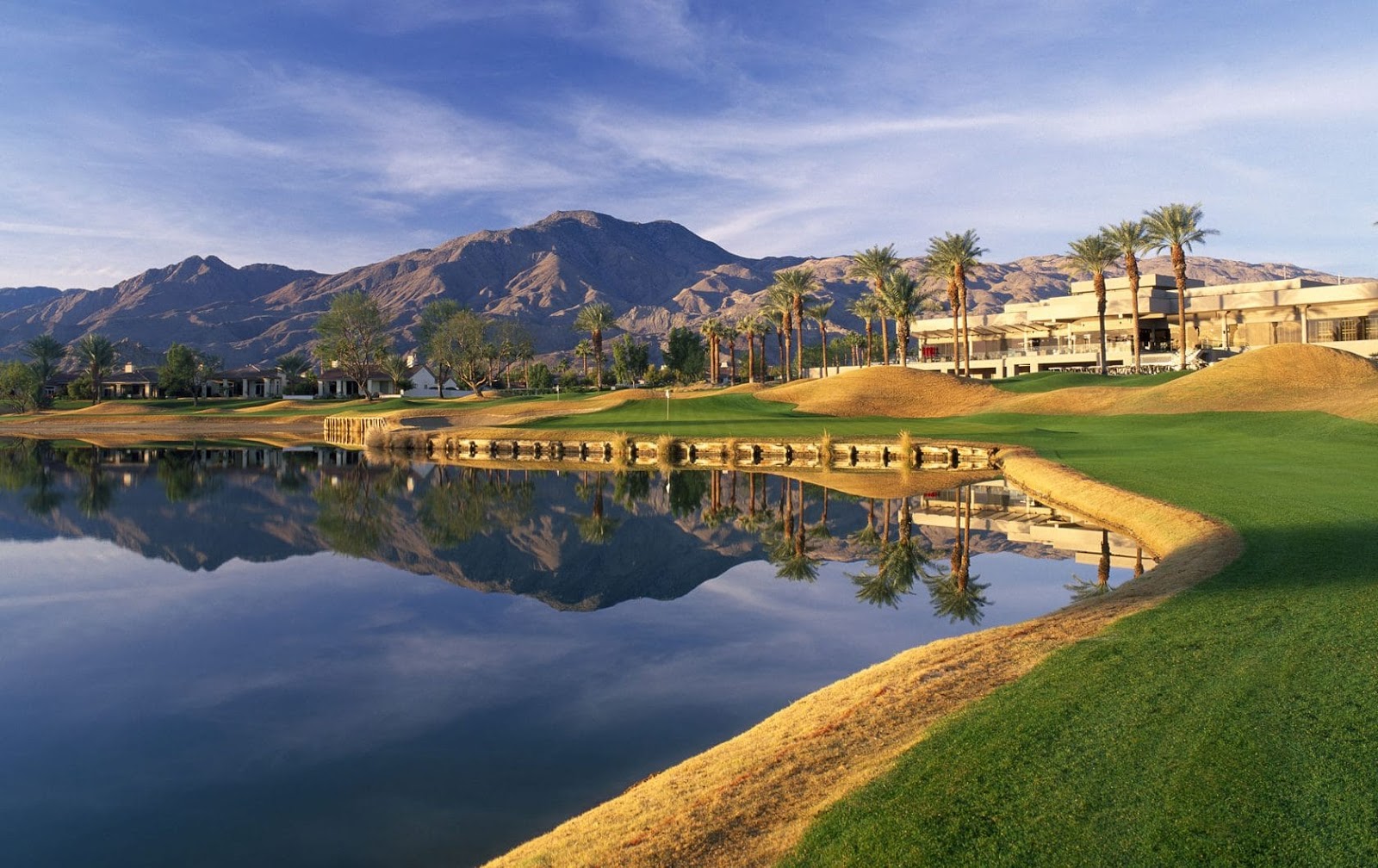 PGA West Nicklaus Tournament Course, fairway and water beneath the Santa Rosa Mountains in La Quinta, California