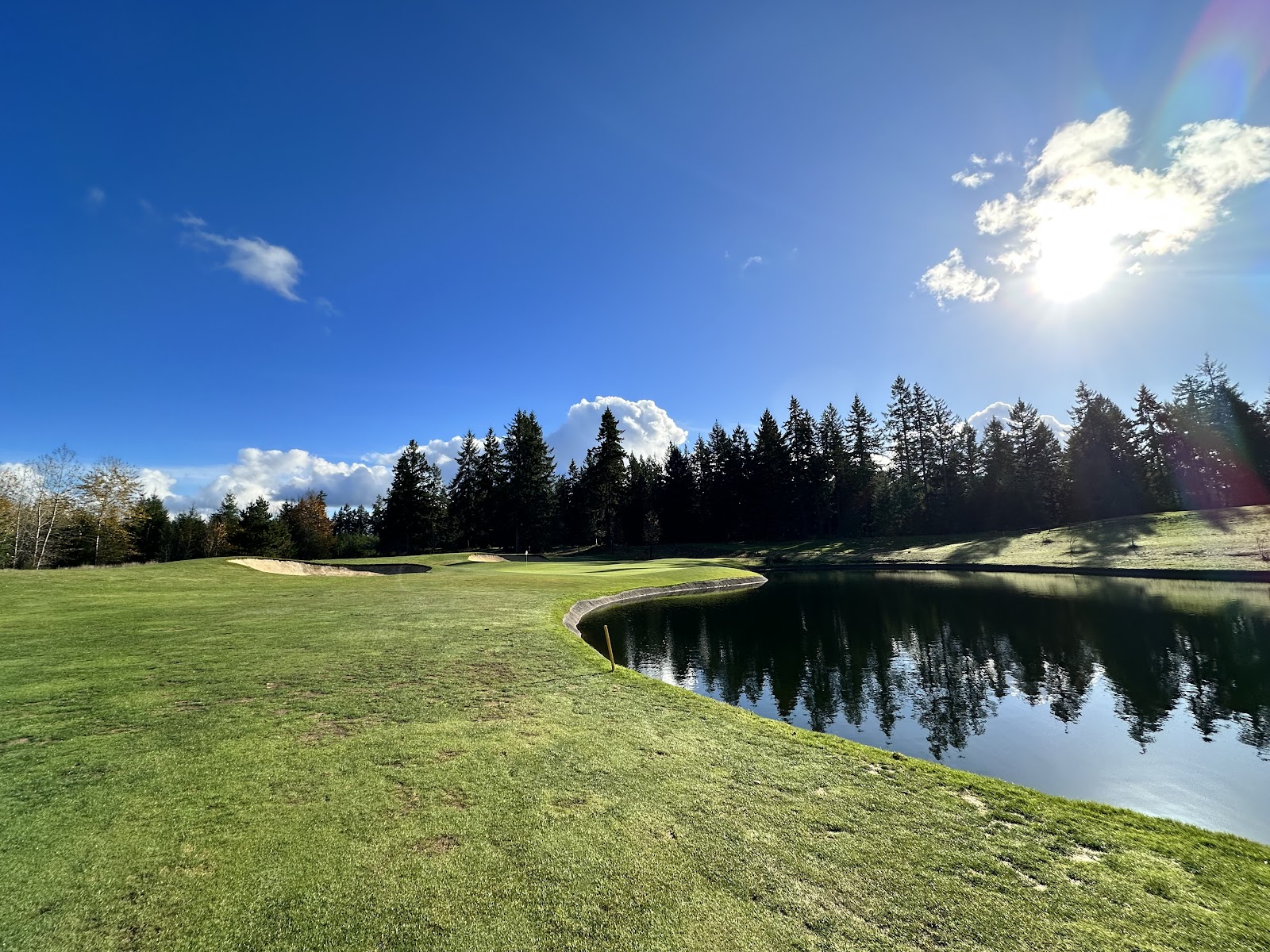 The Home Course, open links style fairway with Puget Sound beyond at DuPont, Washington