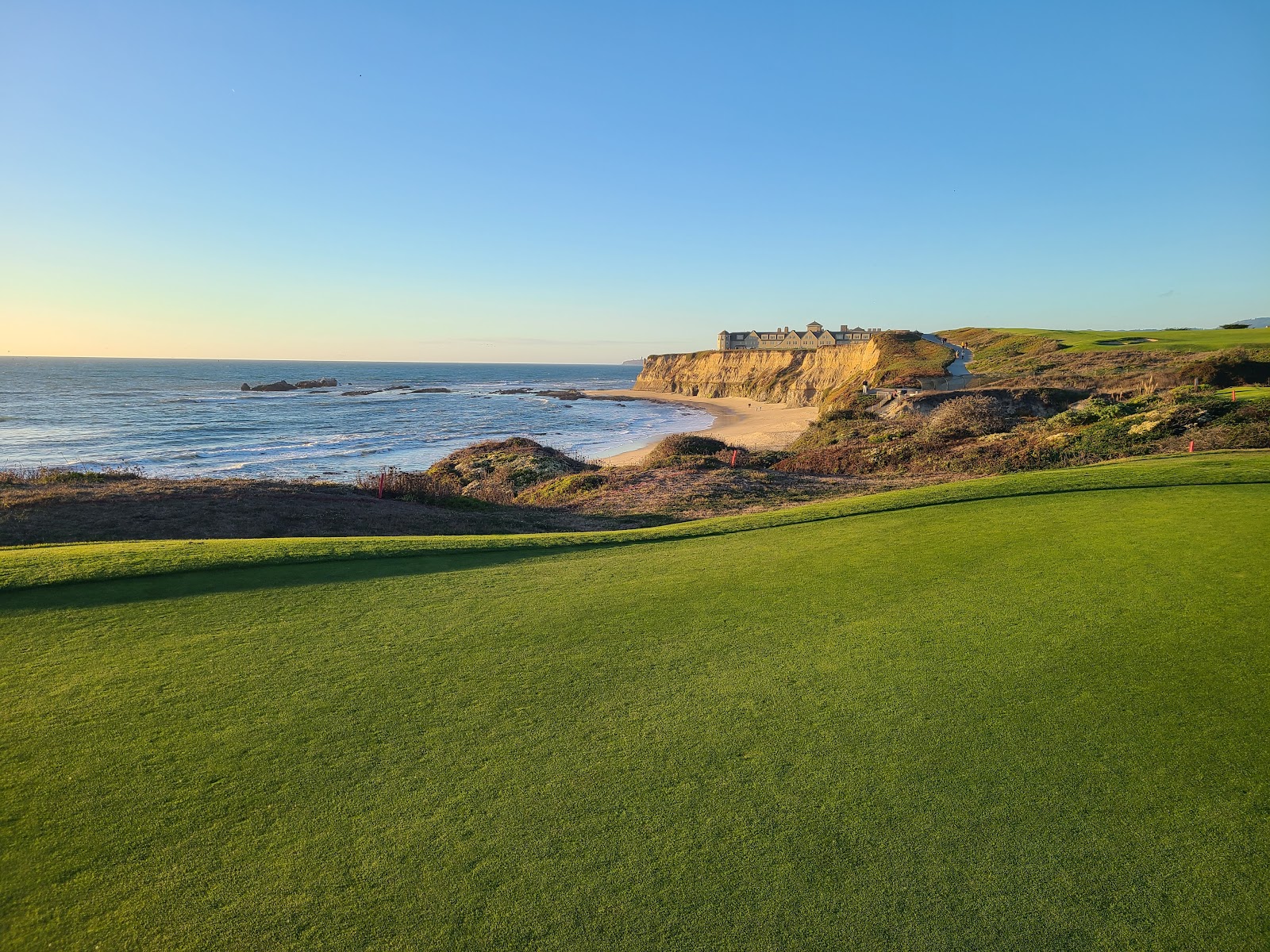 The Links at Spanish Bay, fairway running through coastal dunes toward the Pacific on the Monterey Peninsula