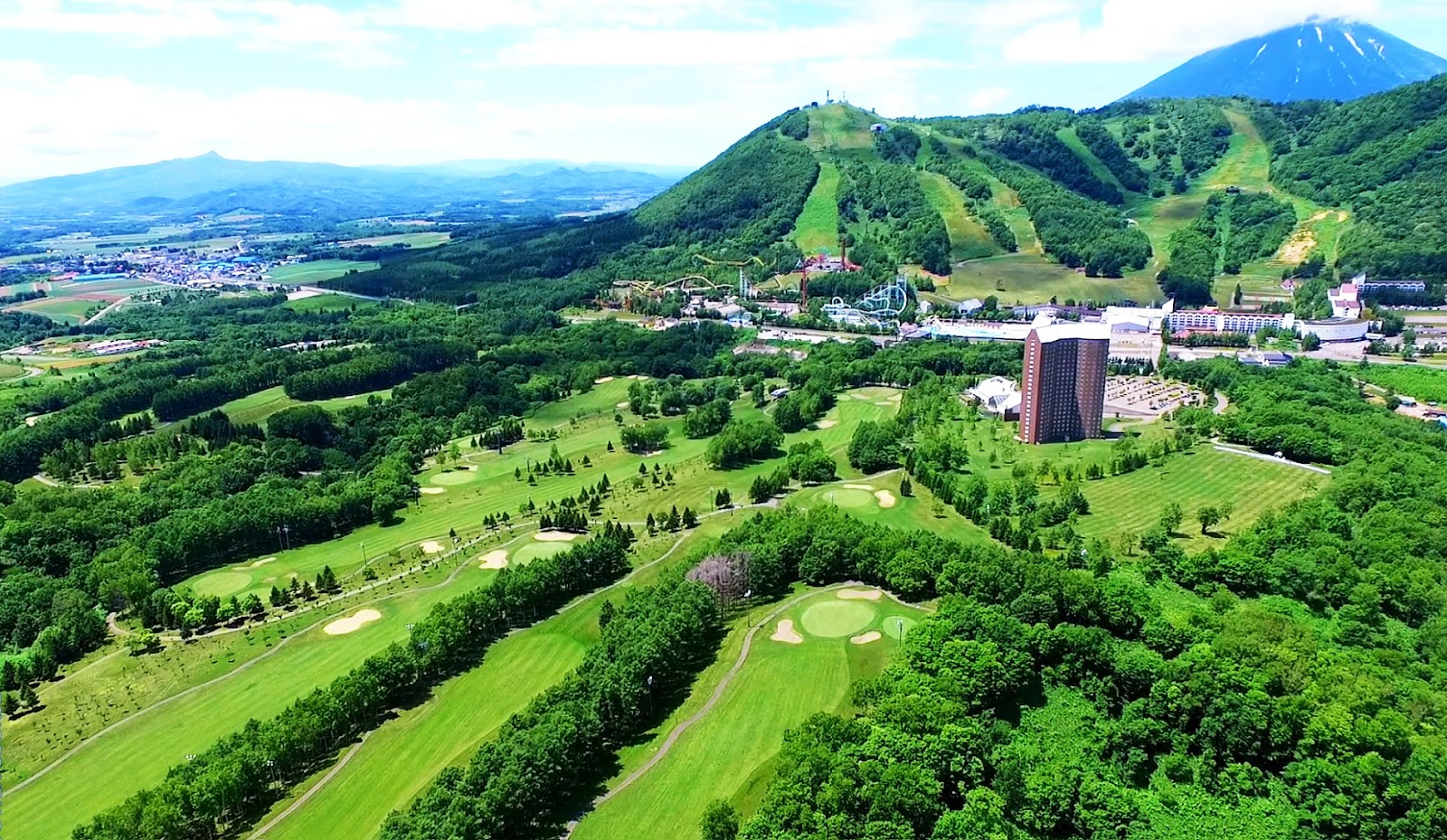 Rusutsu Resort Golf 72 Tower Course fairways beneath Mount Yotei, Hokkaido