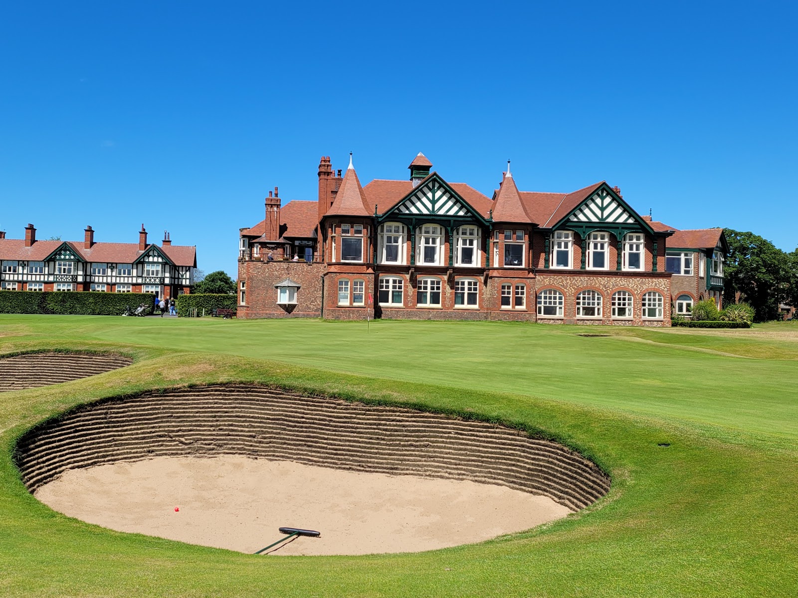 Royal Lytham and St Annes Golf Club, links fairways and the red brick clubhouse on the Fylde coast, Lancashire