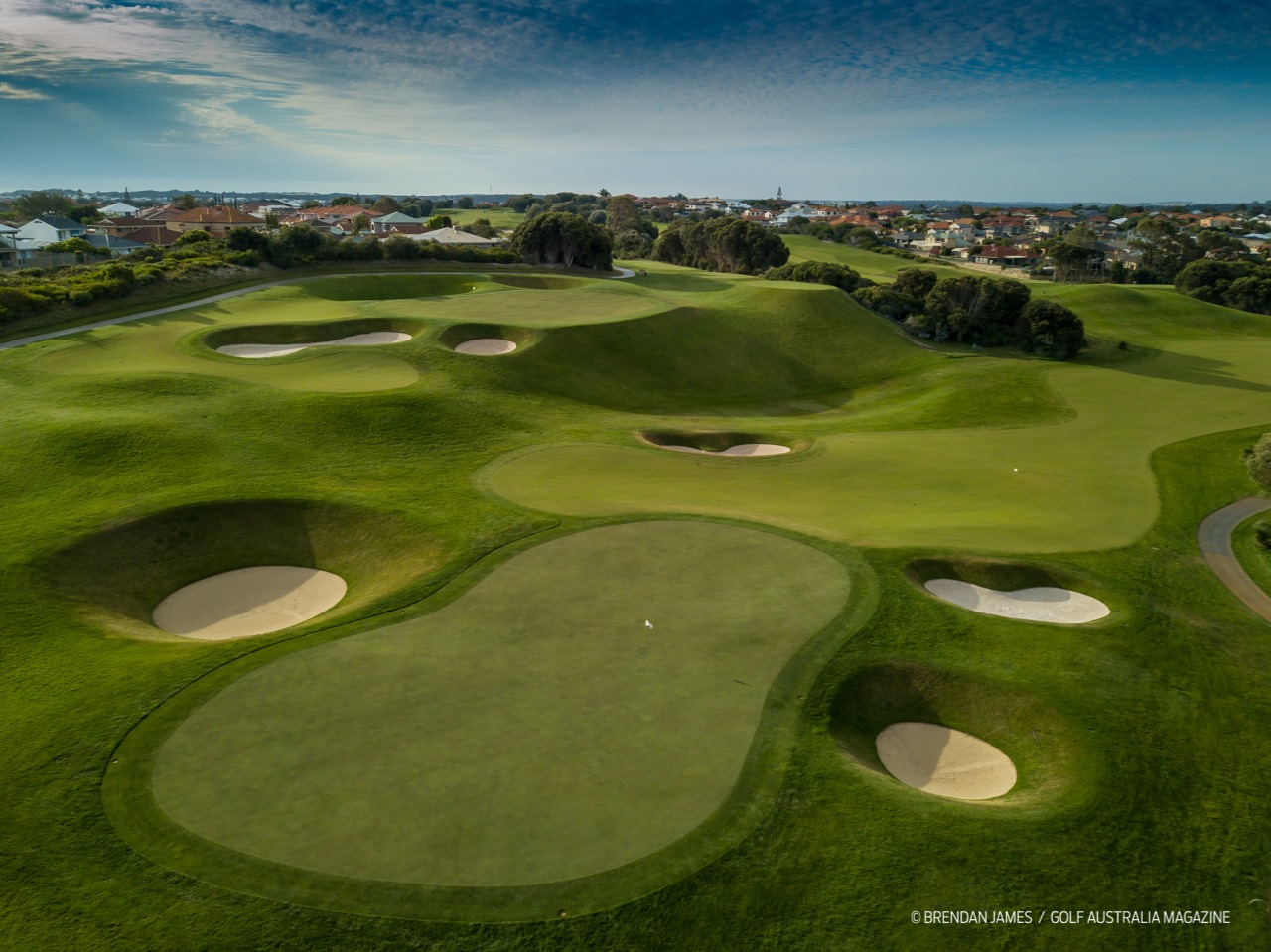 Joondalup Resort golf course, Perth, fairway beneath limestone quarry walls