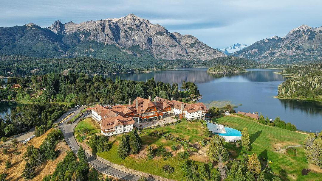Llao Llao resort golf course at Bariloche, Argentine Patagonia, fairway framed by lake and snow capped Andes
