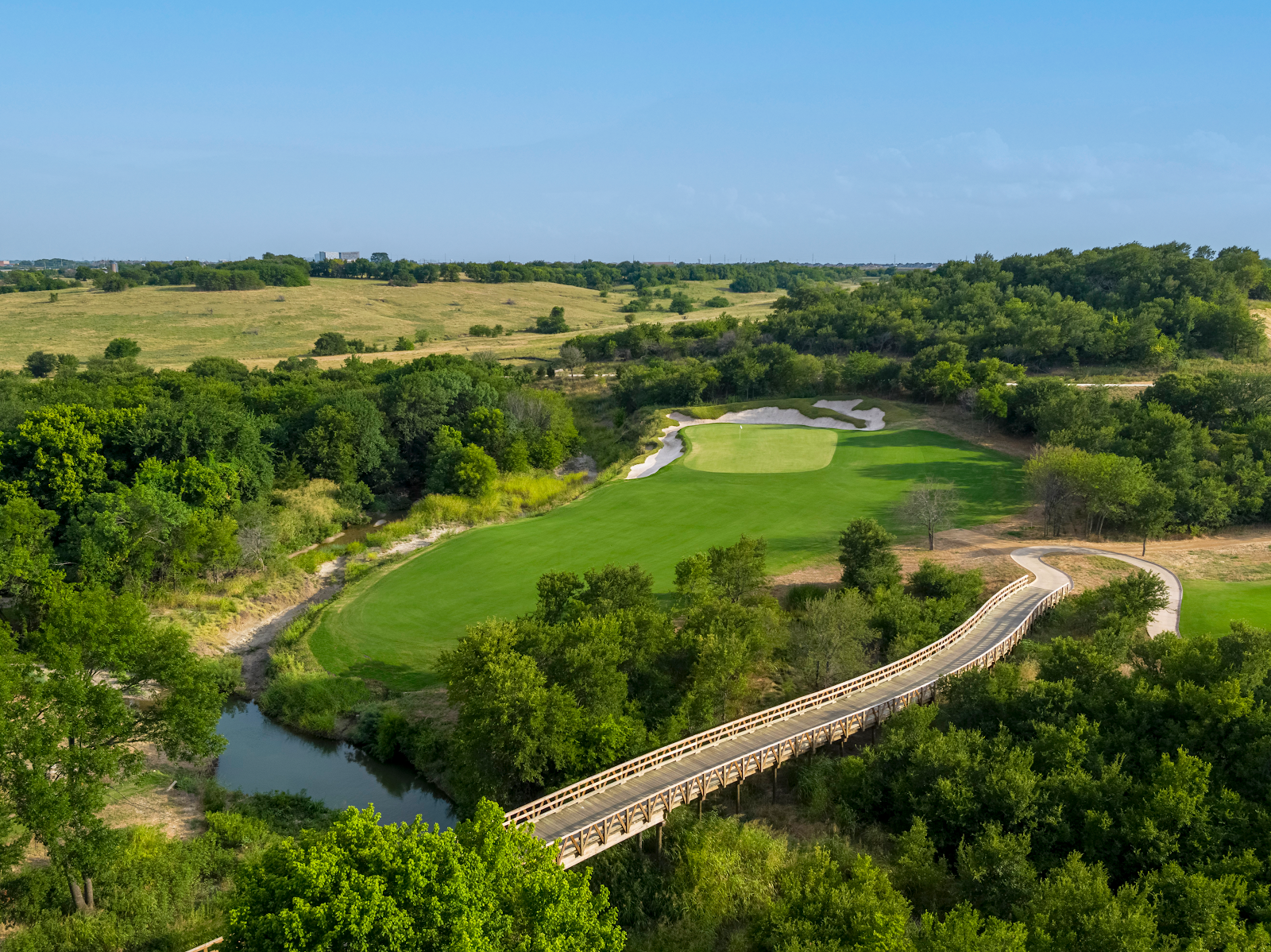 Fields Ranch at PGA Frisco, rolling North Texas terrain and native grasses framing the fairways