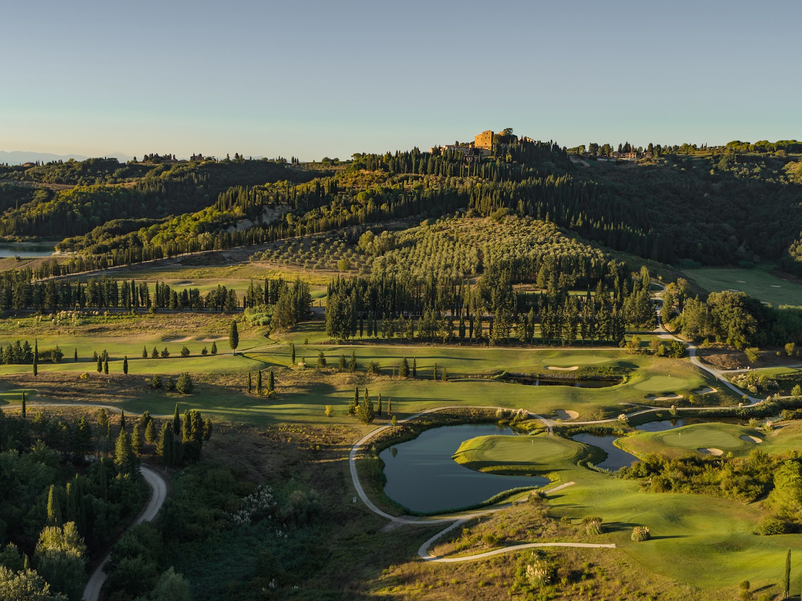 Castelfalfi Golf Club fairways in the rolling hills of Tuscany, Italy